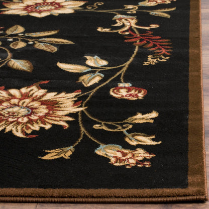 Carolane Black Area Rug 8'9” x12’